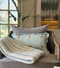 Striped Green Cushion with Oranges detail