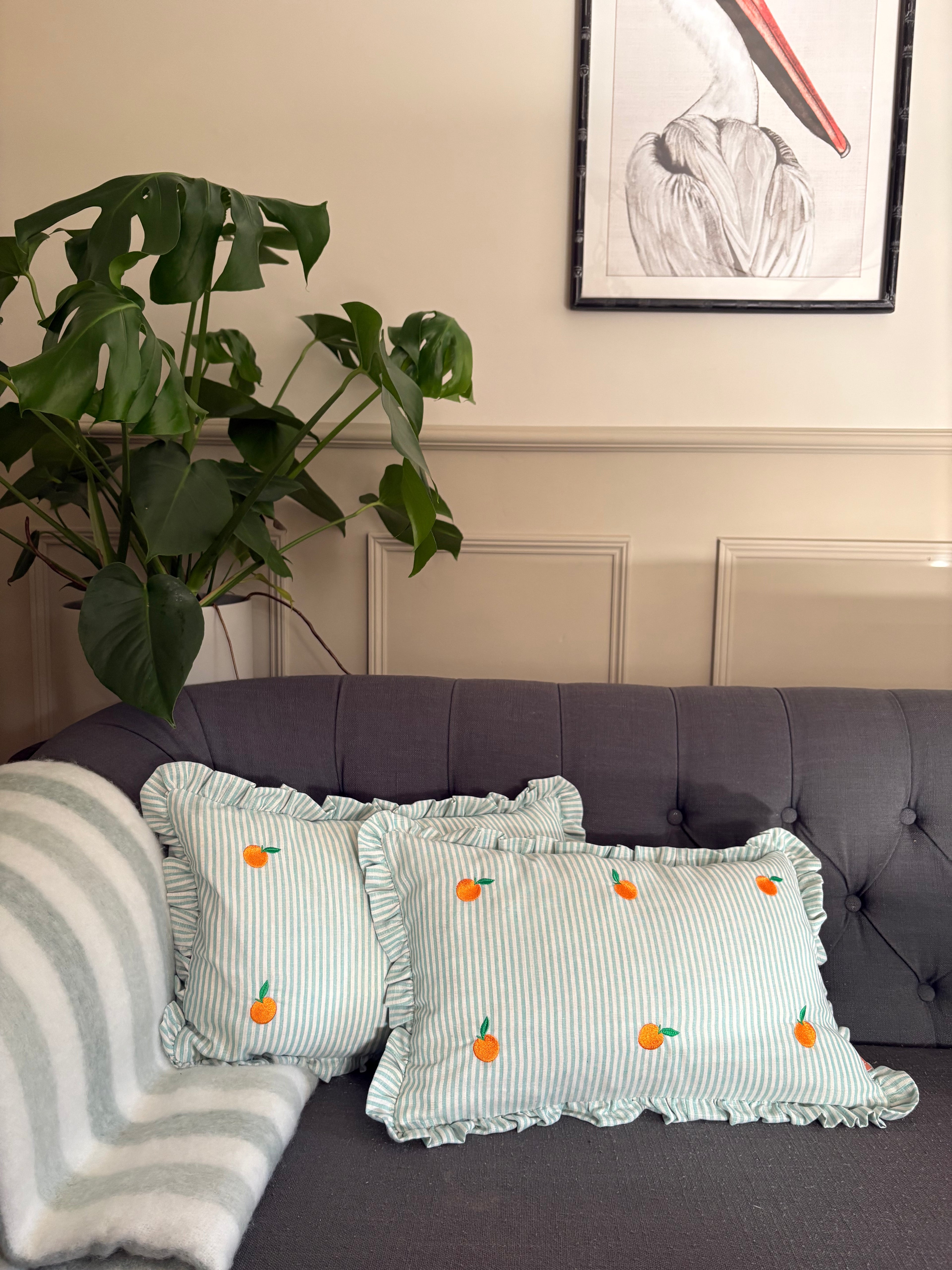 Striped Green Cushion with Oranges detail